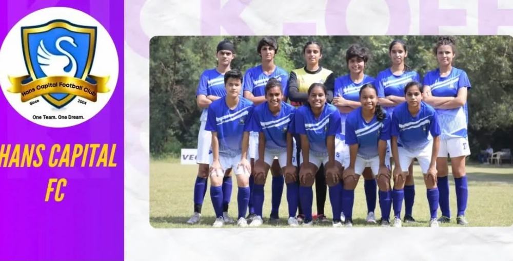 Hans Capital FC team photo in blue kit beside the club crest